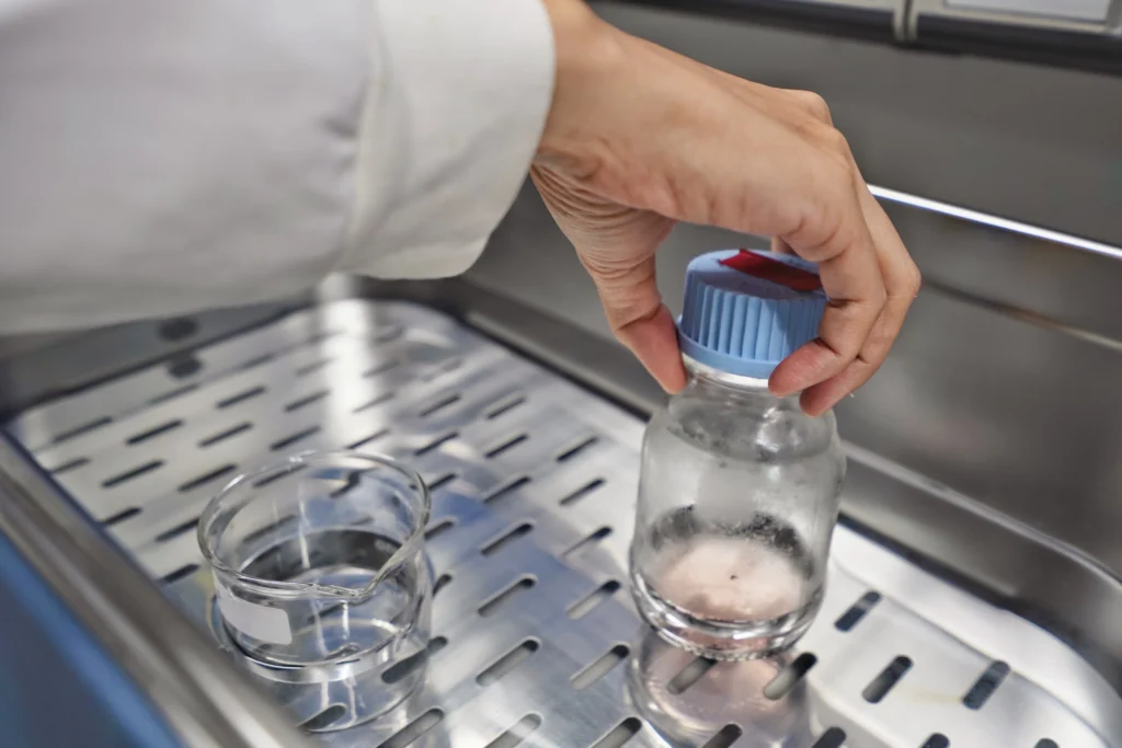 laboratory water bath used for sample preparation and heating chemical solution in glass container